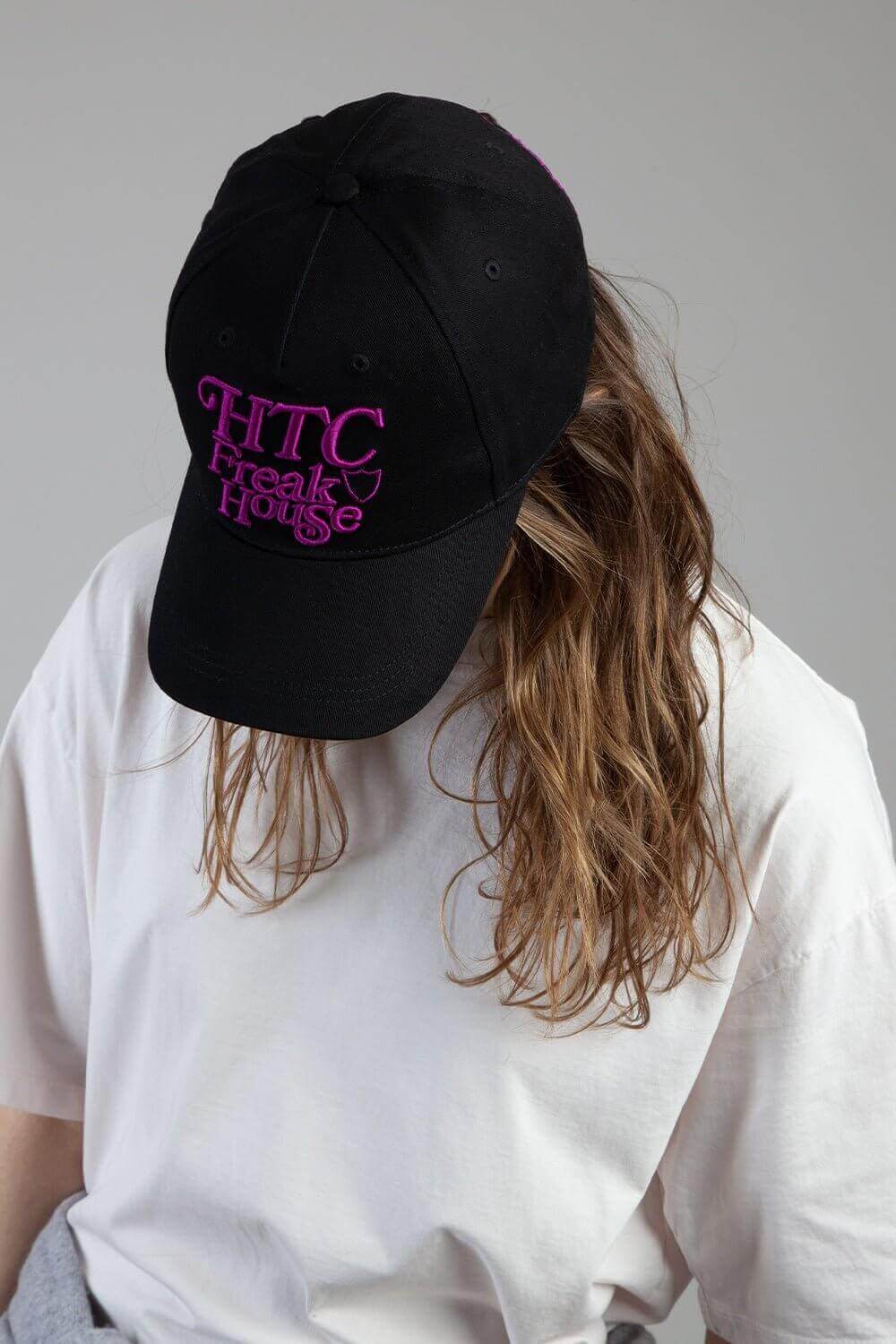 FREAK HOUSE CAP Black baseball cap , round crown with eyelets, Freak House logo embroidered on the front, adjustable strap on the back. One size fits all. 100% cotton. HTC LOS ANGELES