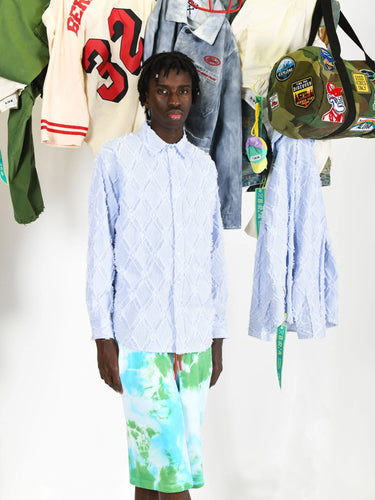 Overshirt a righe con cuciture losanghe sfrangiate